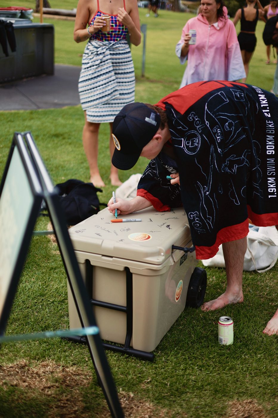 A newbie signing the Newbie Nation esky