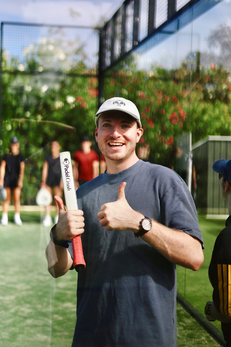 A newbie giving a thumbs up on the padel court