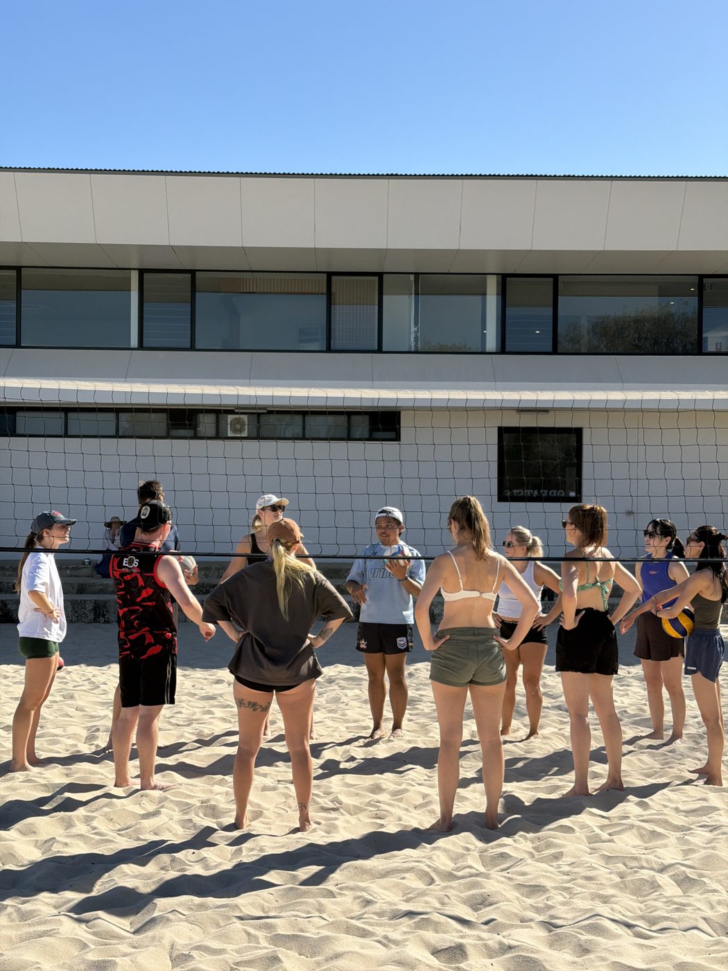 Volleyball social players on the sand